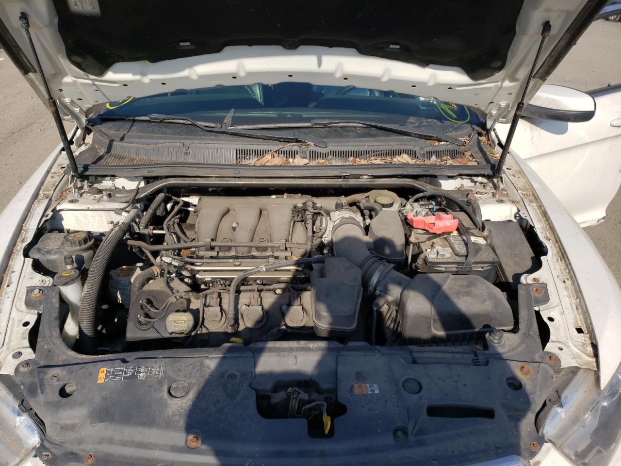 Photo 7 from auction – 2013 FORD TAURUS SEL with VIN 1FAHP2E8XDG123834