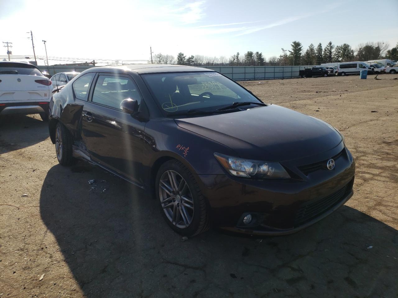 TOYOTA SCION TC 2011 with VIN JTKJF5C76B3011720 - Photo from auction