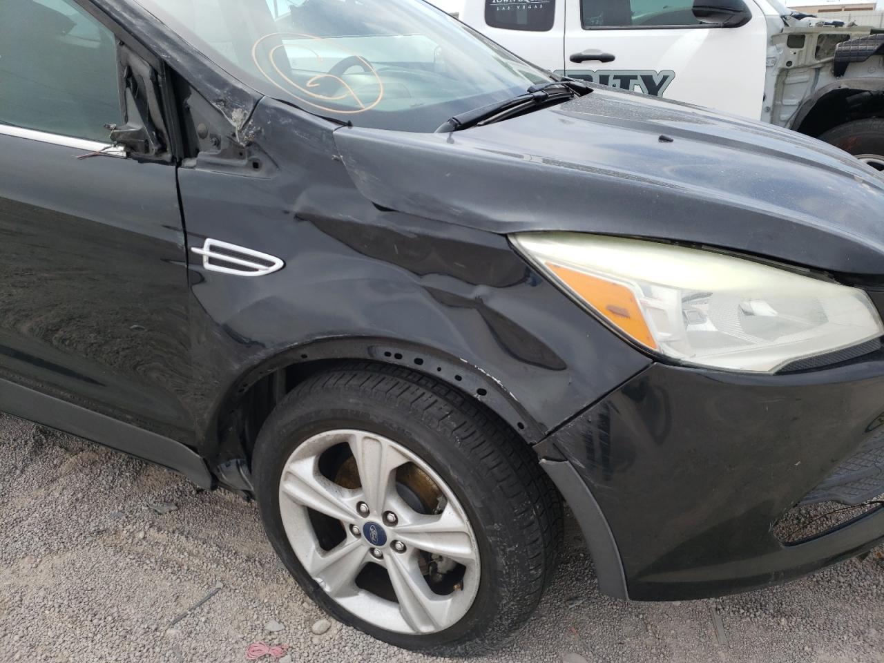 Photo 9 from auction – 2013 FORD ESCAPE SE with VIN 1FMCU0GX3DUC55174