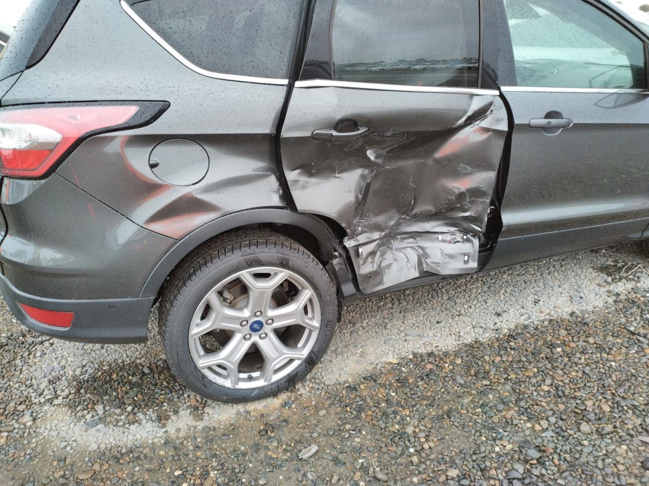 Photo 9 from auction – 2017 FORD ESCAPE TIT with VIN 1FMCU0J96HUD29347