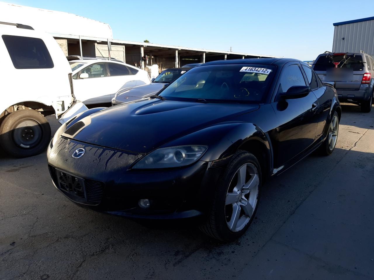 Photo 2 from auction – 2004 MAZDA RX8 with VIN JM1FE173040110294