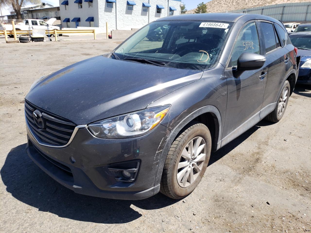 Photo 2 from auction – 2016 MAZDA CX-5 TOURI with VIN JM3KE4CY8G0856344