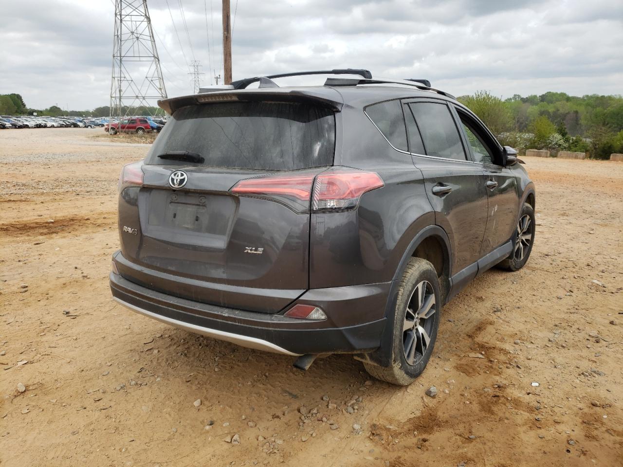 Photo 4 from auction – 2016 TOYOTA RAV4 XLE with VIN 2T3WFREV5GW272714