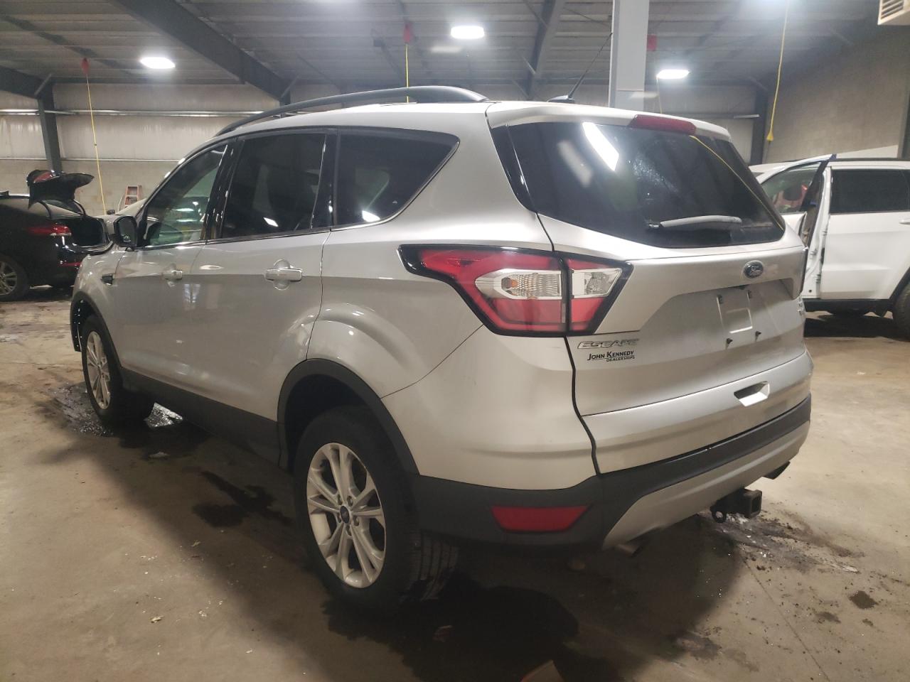 Photo 3 from auction – 2018 FORD ESCAPE SE with VIN 1FMCU9GD1JUC28707