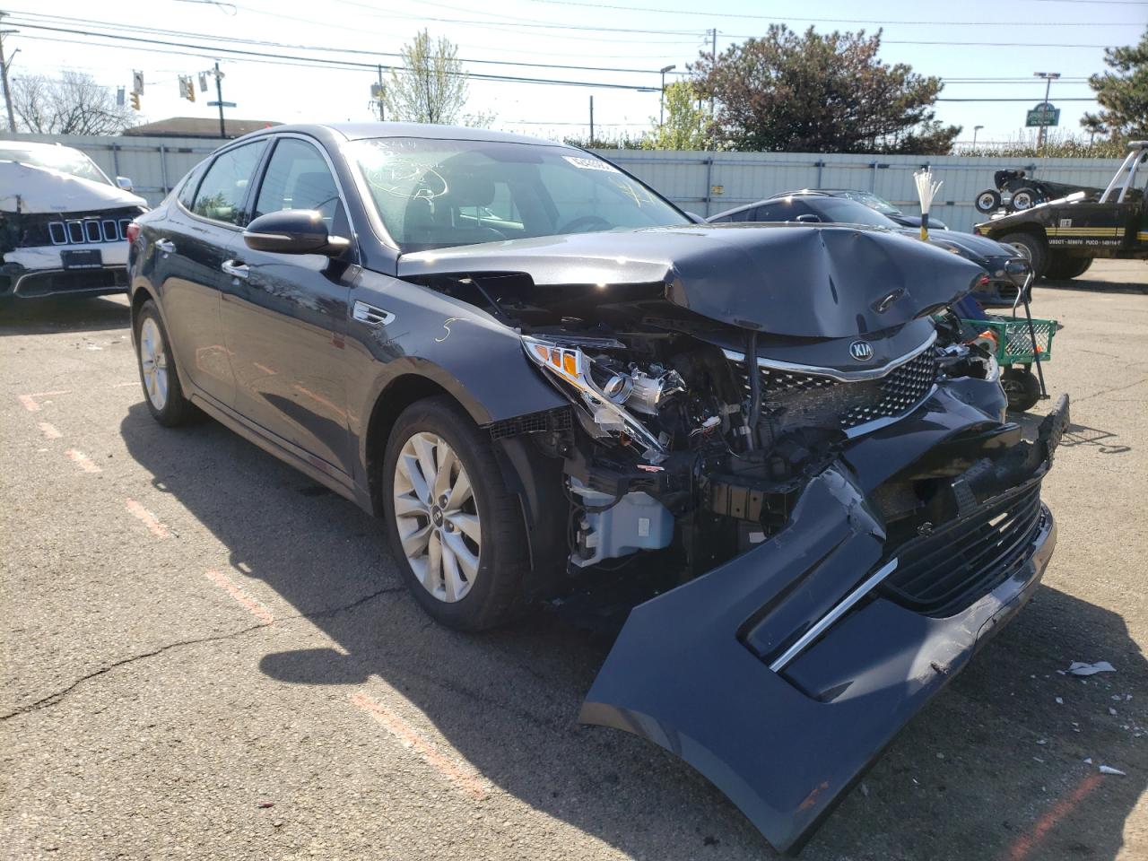 KIA OPTIMA EX 2018 with VIN 5XXGU4L34JG205658 - Photo from auction