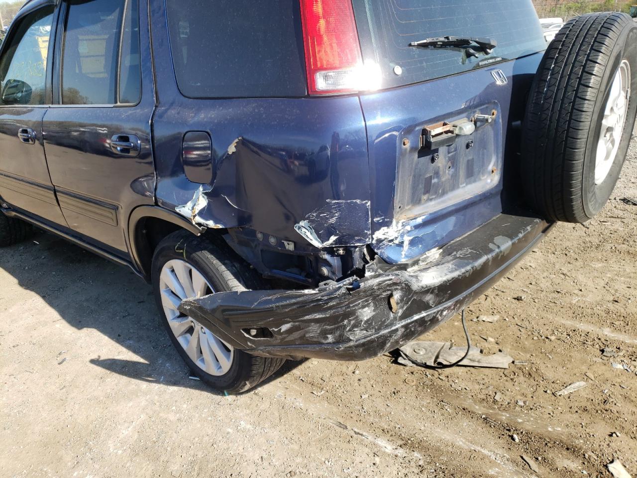 Photo 9 from auction – 1999 HONDA CR-V with VIN JHLRD1842XC063699