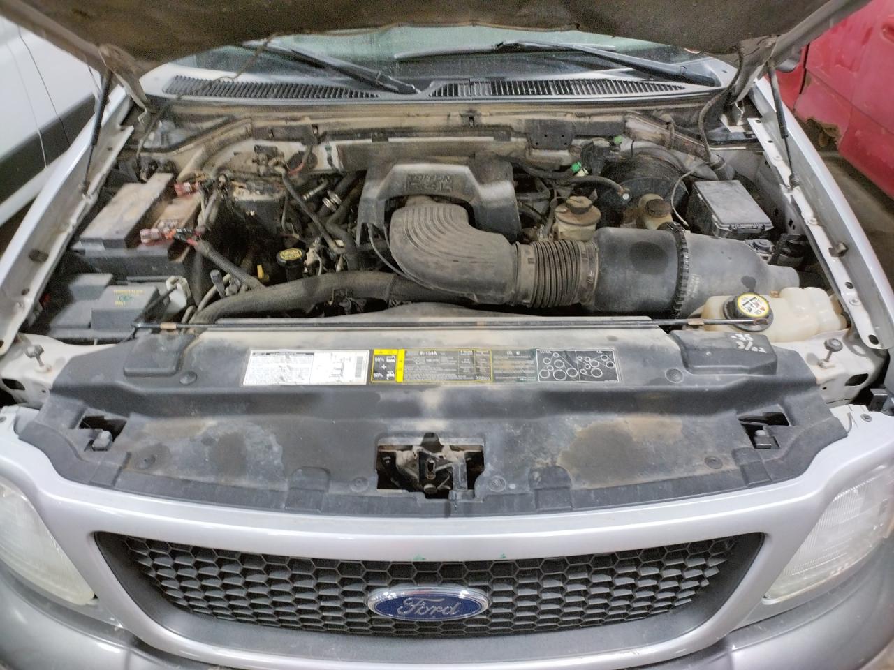 Photo 7 from auction – 2002 FORD F150 with VIN 1FTRX18L42NA93280