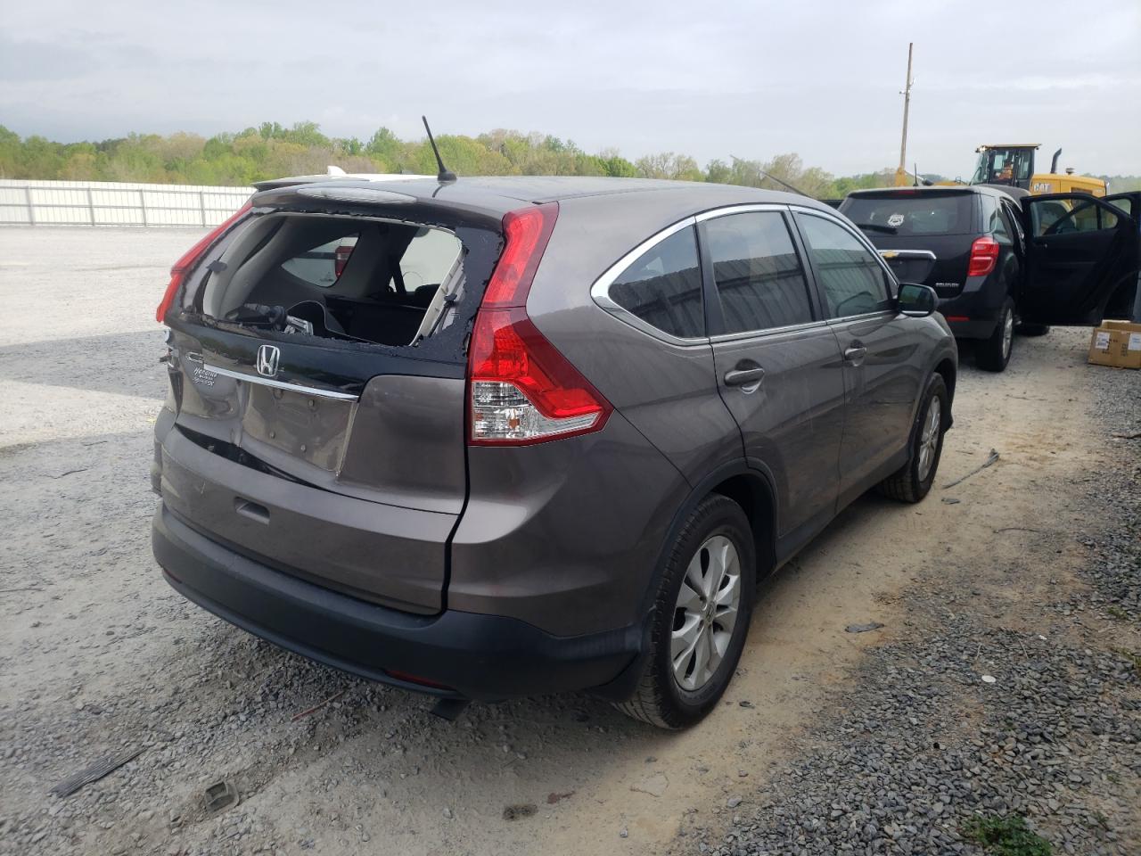 Photo 4 from auction – 2014 HONDA CR-V with VIN 5J6RM3H56EL000386