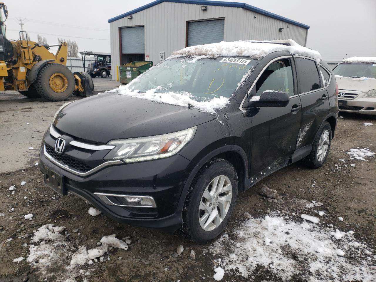 Photo 2 from auction – 2016 HONDA CR-V EXL with VIN 5J6RM4H75GL074294