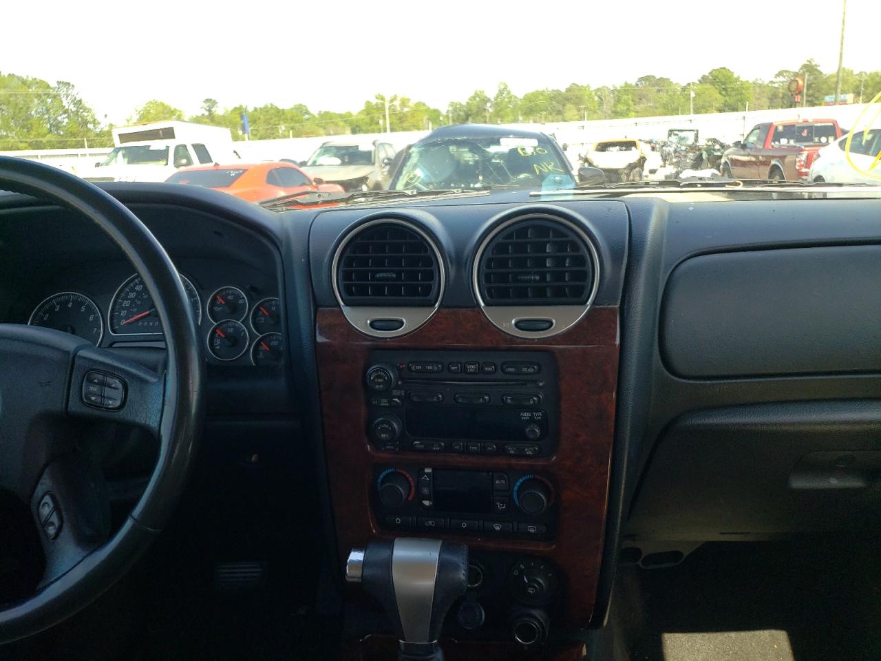 Photo 9 from auction – 2006 GMC ENVOY with VIN 1GKDT13S862272275