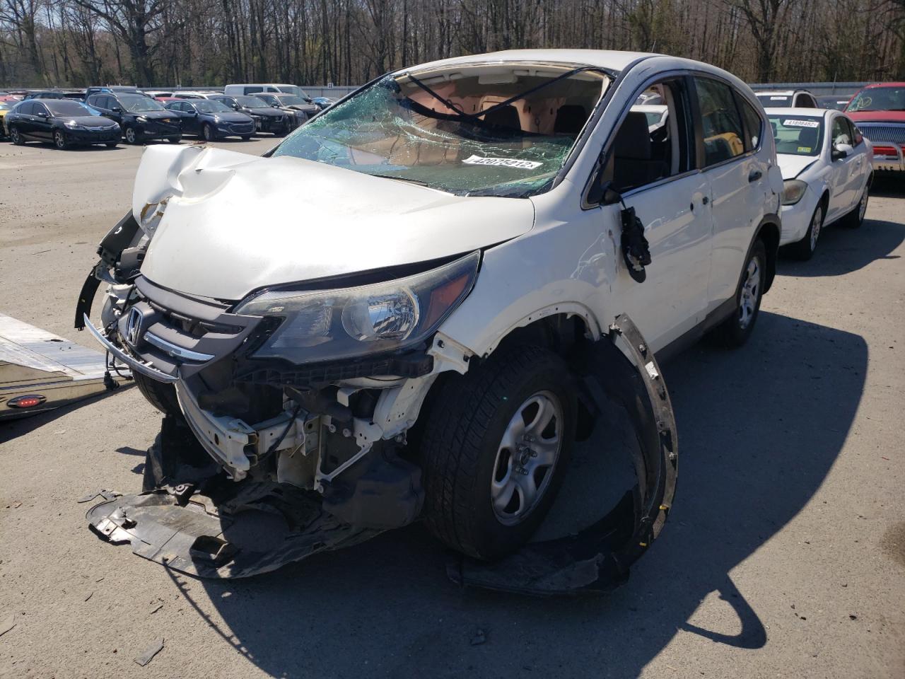 Photo 2 from auction – 2014 HONDA CR-V LX with VIN 5J6RM4H30EL084189