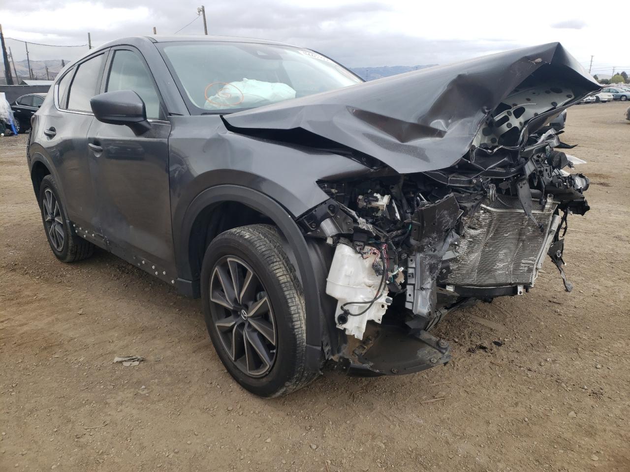 MAZDA CX-5 TOURI 2018 with VIN JM3KFACM1J0363041 - Photo from auction