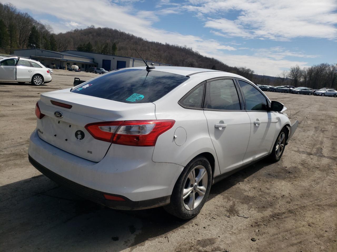 Photo 4 from auction – 2014 FORD FOCUS SE with VIN 1FADP3F24EL375876