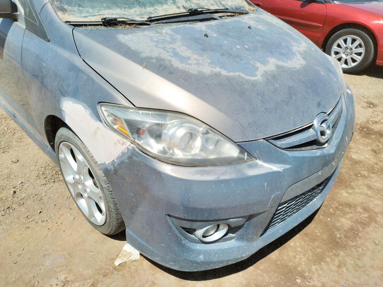 Photo 9 from auction – 2010 MAZDA 5 with VIN JM1CR2WL6A0373688