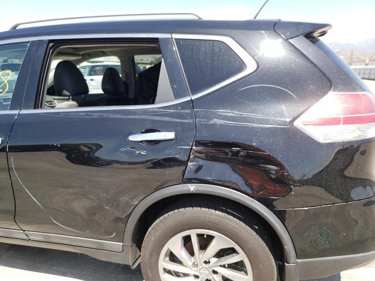 Photo 9 from auction – 2015 NISSAN ROGUE S with VIN 5N1AT2MV2FC769342