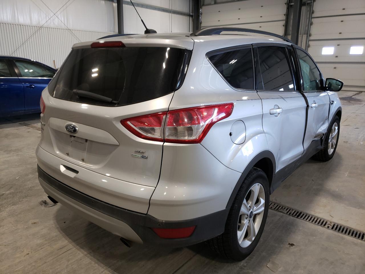 Photo 4 from auction – 2016 FORD ESCAPE SE with VIN 1FMCU9GX1GUA65382
