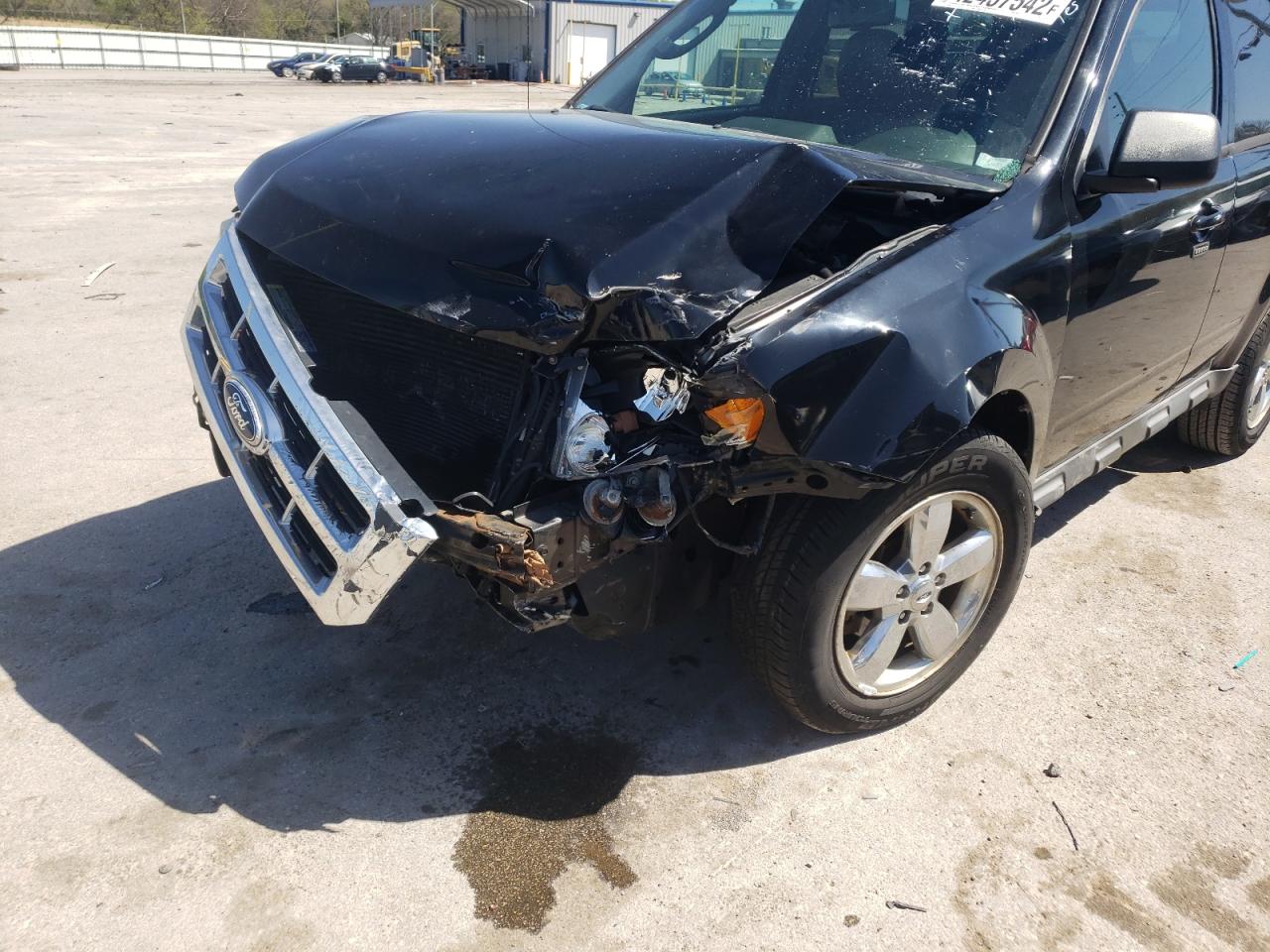 Photo 9 from auction – 2010 FORD ESCAPE LIM with VIN 1FMCU0EG9AKD11239