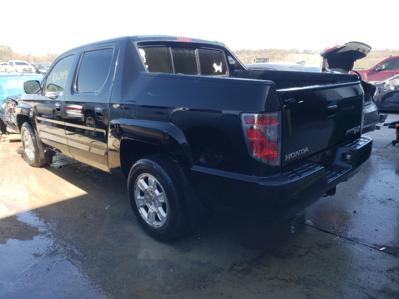 Photo 3 from auction – 2012 HONDA RIDGELINE with VIN 5FPYK1F42CB457855