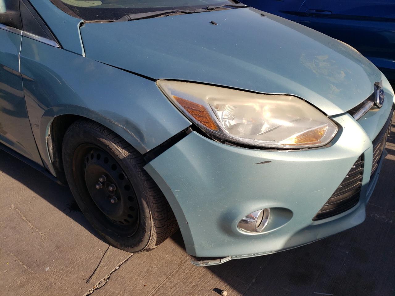 Photo 9 from auction – 2012 FORD FOCUS SEL with VIN 1FAHP3H21CL344533