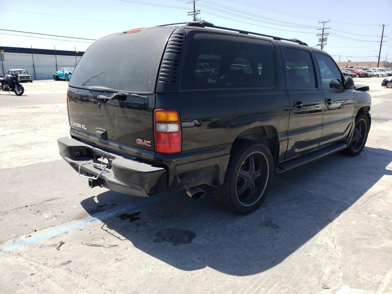 Photo 4 from auction – 2002 GMC DENALI XL with VIN 1GKFK66U92J326351
