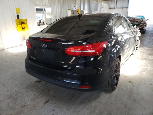 Photo 4 from auction – 2016 FORD FOCUS SE with VIN 1FADP3F23GL228371