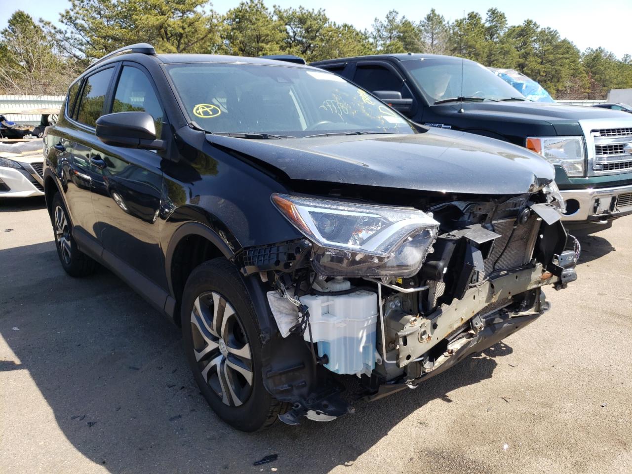 TOYOTA RAV4 LE 2018 with VIN 2T3BFREV3JW731390 - Photo from auction