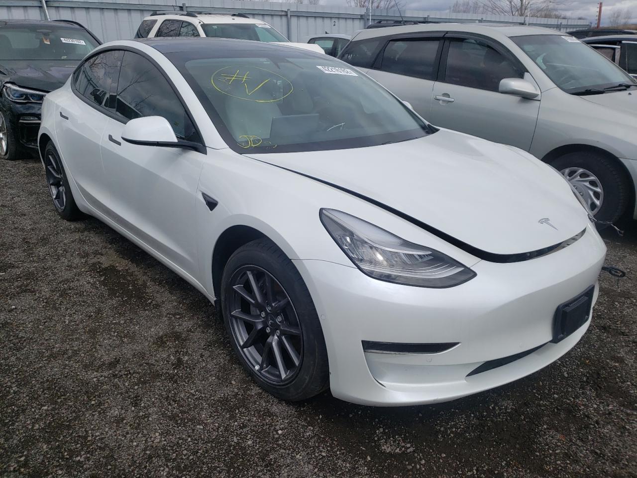 TESLA MODEL 3 2021 with VIN 5YJ3E1EA8MF856871 - Photo from auction
