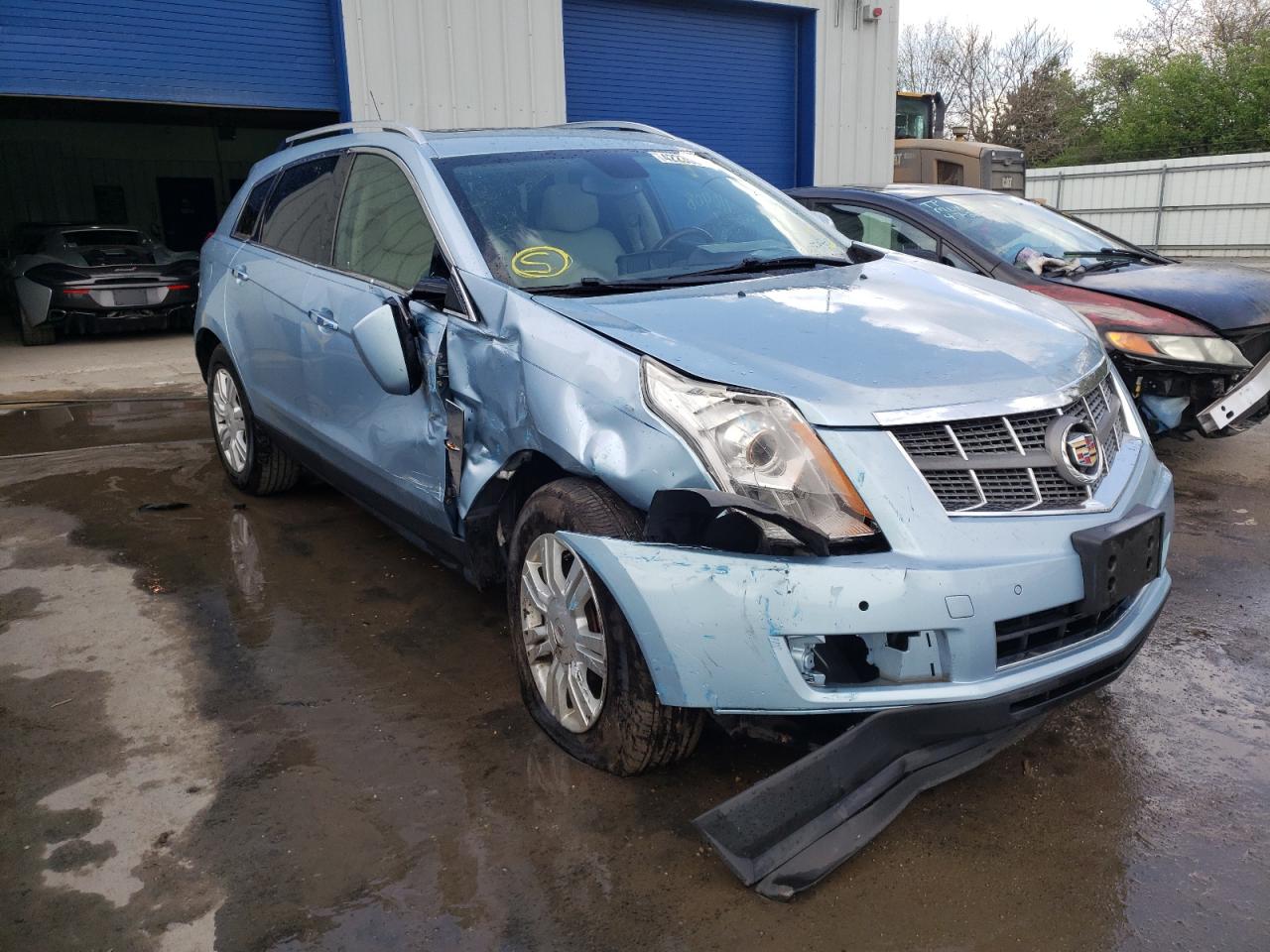 CADILLAC SRX LUXURY 2011 with VIN 3GYFNAEY4BS648432 - Photo from auction