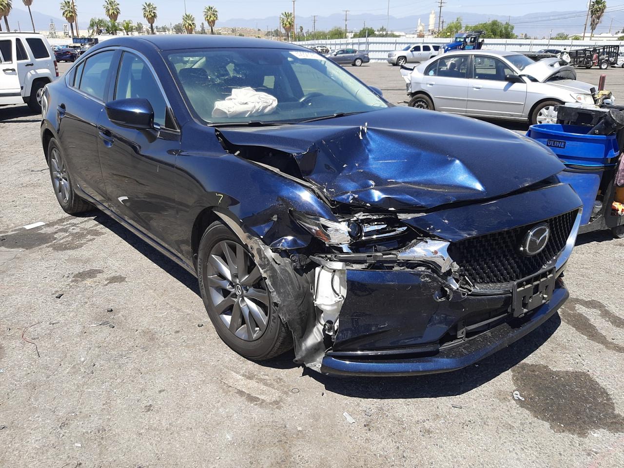 MAZDA 6 SPORT 2018 with VIN JM1GL1UM2J1313345 - Photo from auction