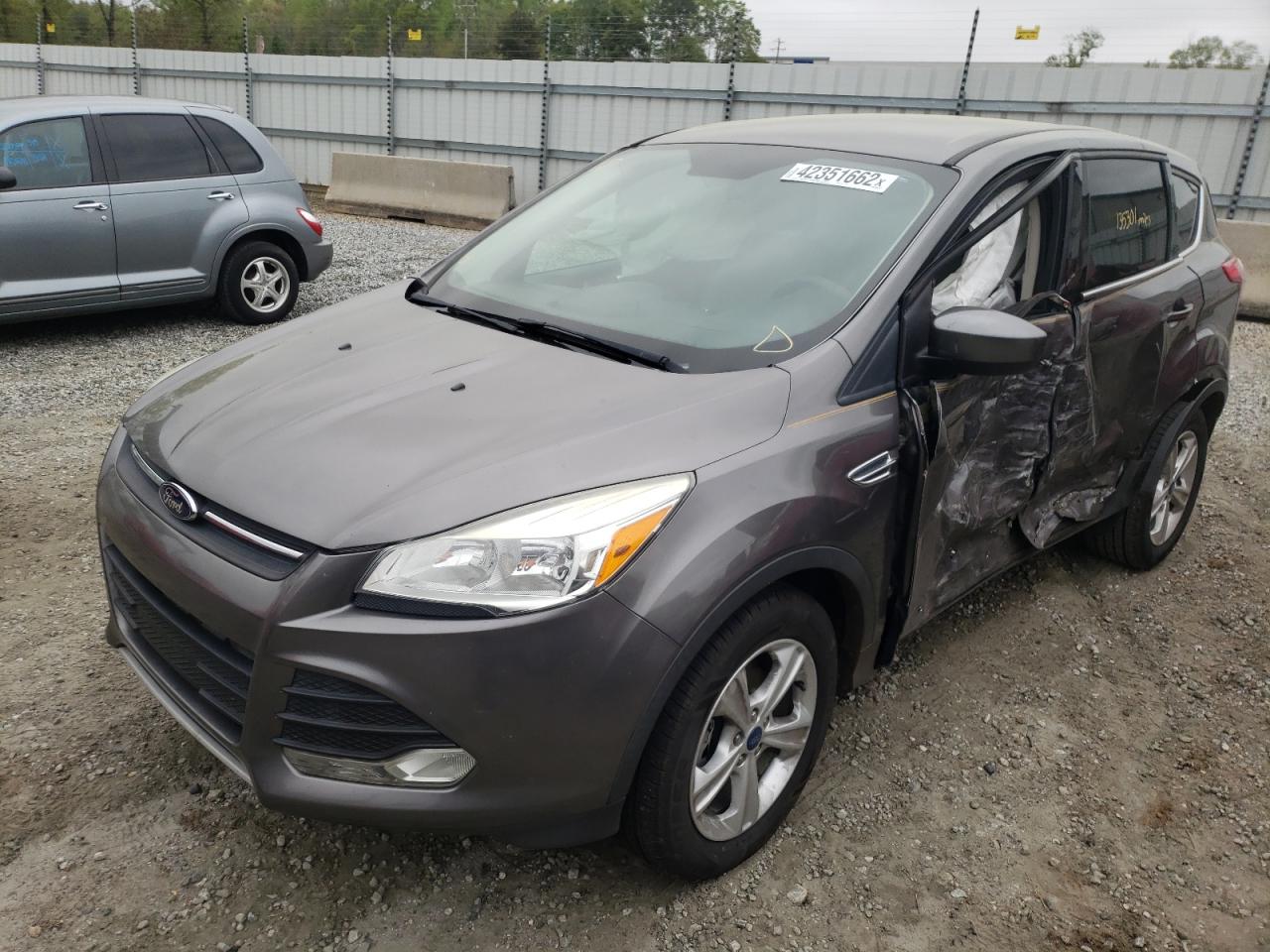 Photo 2 from auction – 2013 FORD ESCAPE SE with VIN 1FMCU0GXXDUD18139