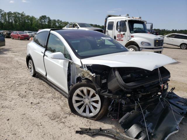 TESLA MODEL X 2020 with VIN 5YJXCAE29LF233449 - Photo from auction