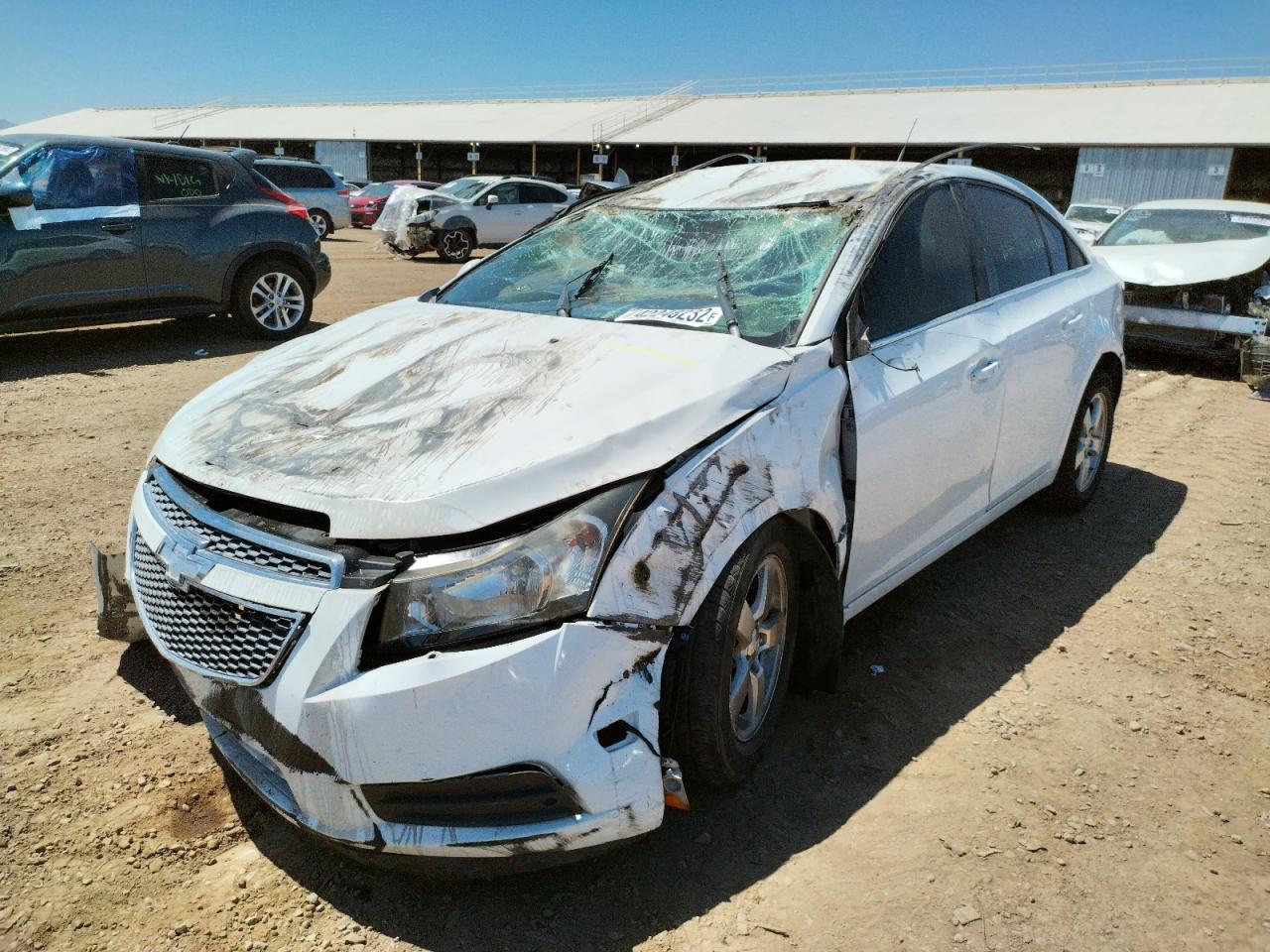 Photo 2 from auction – 2014 CHEVROLET CRUZE LT with VIN 1G1PC5SB4E7298450