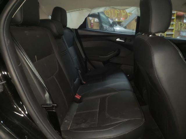 Photo 6 from auction – 2015 FORD FOCUS TITA with VIN 1FADP3N24FL217766