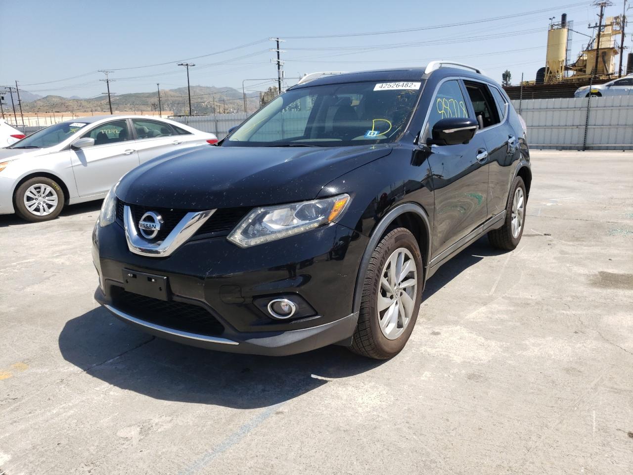 Photo 2 from auction – 2015 NISSAN ROGUE S with VIN 5N1AT2MV2FC769342