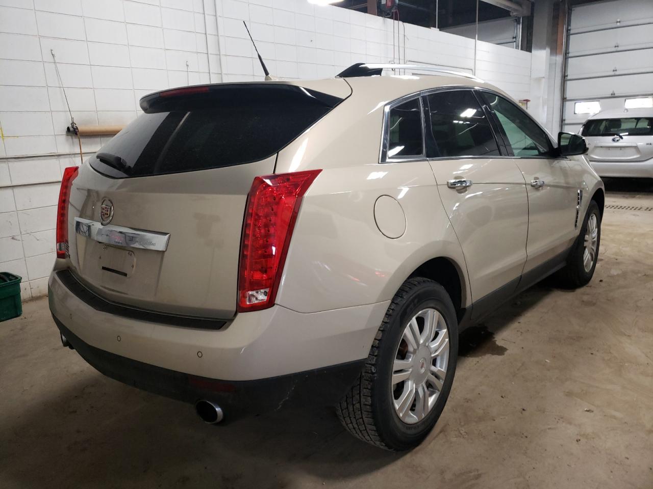 Photo 4 from auction – 2011 CADILLAC SRX LUXURY with VIN 3GYFNAEY6BS553497
