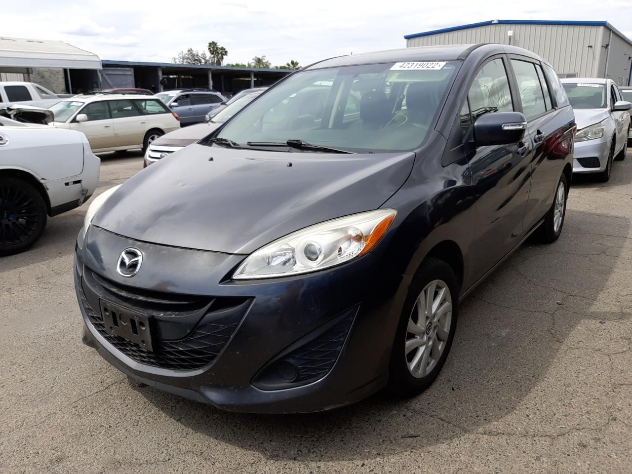 Photo 2 from auction – 2015 MAZDA 5 SPORT with VIN JM1CW2BL0F0181687