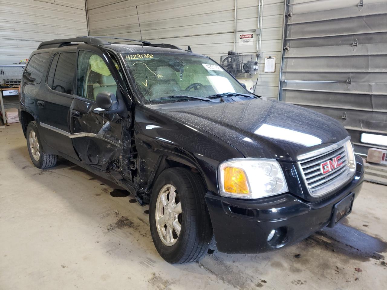 GMC ENVOY XL 2006 with VIN 1GKET16S166133467 - Photo from auction