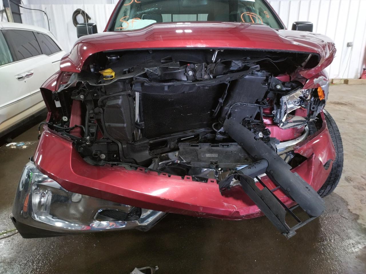 Photo 9 from auction – 2014 RAM 1500 SLT with VIN 1C6RR7GG1ES401911