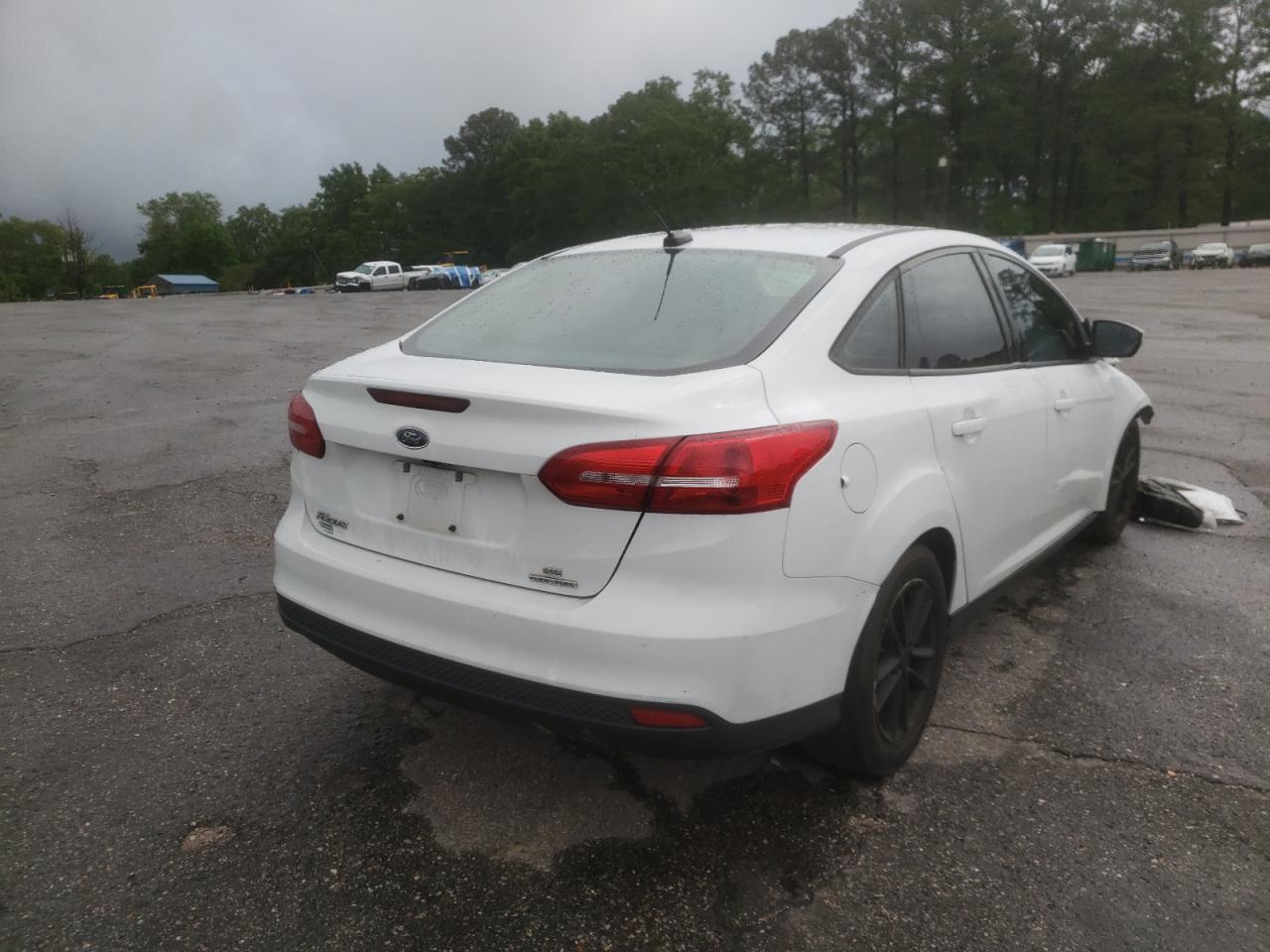 Photo 4 from auction – 2016 FORD FOCUS SE with VIN 1FADP3F20GL294716