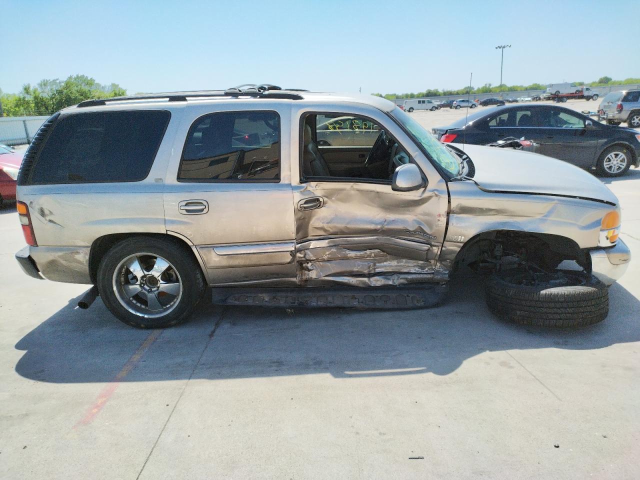Photo 9 from auction – 2002 GMC YUKON with VIN 1GKEC13V02R324448