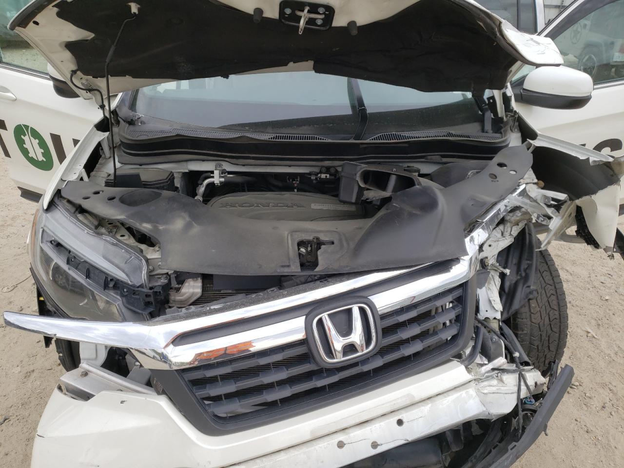 Photo 7 from auction – 2017 HONDA RIDGELINE with VIN 5FPYK3F66HB016234