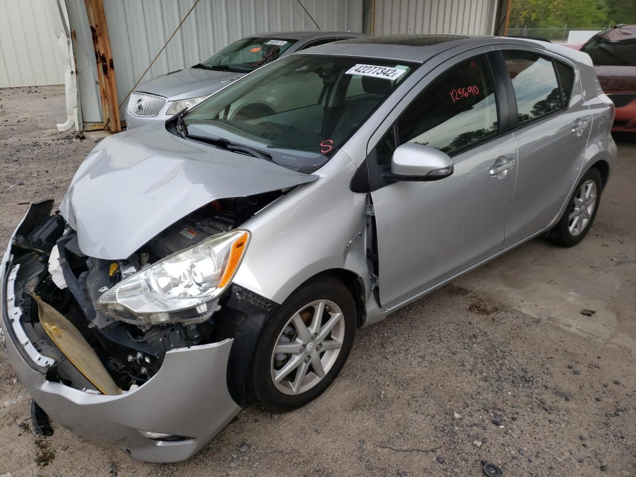 Photo 2 from auction – 2014 TOYOTA PRIUS C with VIN JTDKDTB34E1062587