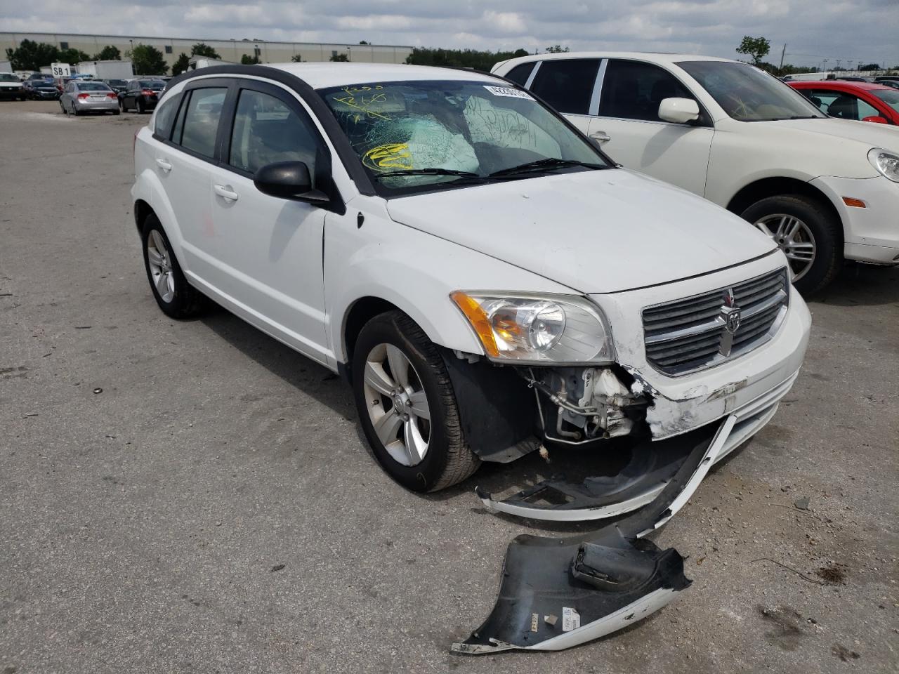 DODGE CALIBER MA 2011 with VIN 1B3CB3HA7BD167880 - Photo from auction