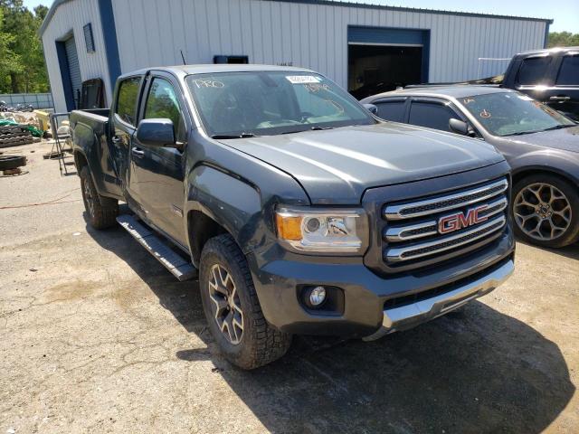 GMC CANYON SLE 2015 with VIN 1GTG6BE32F1128464 - Photo from auction