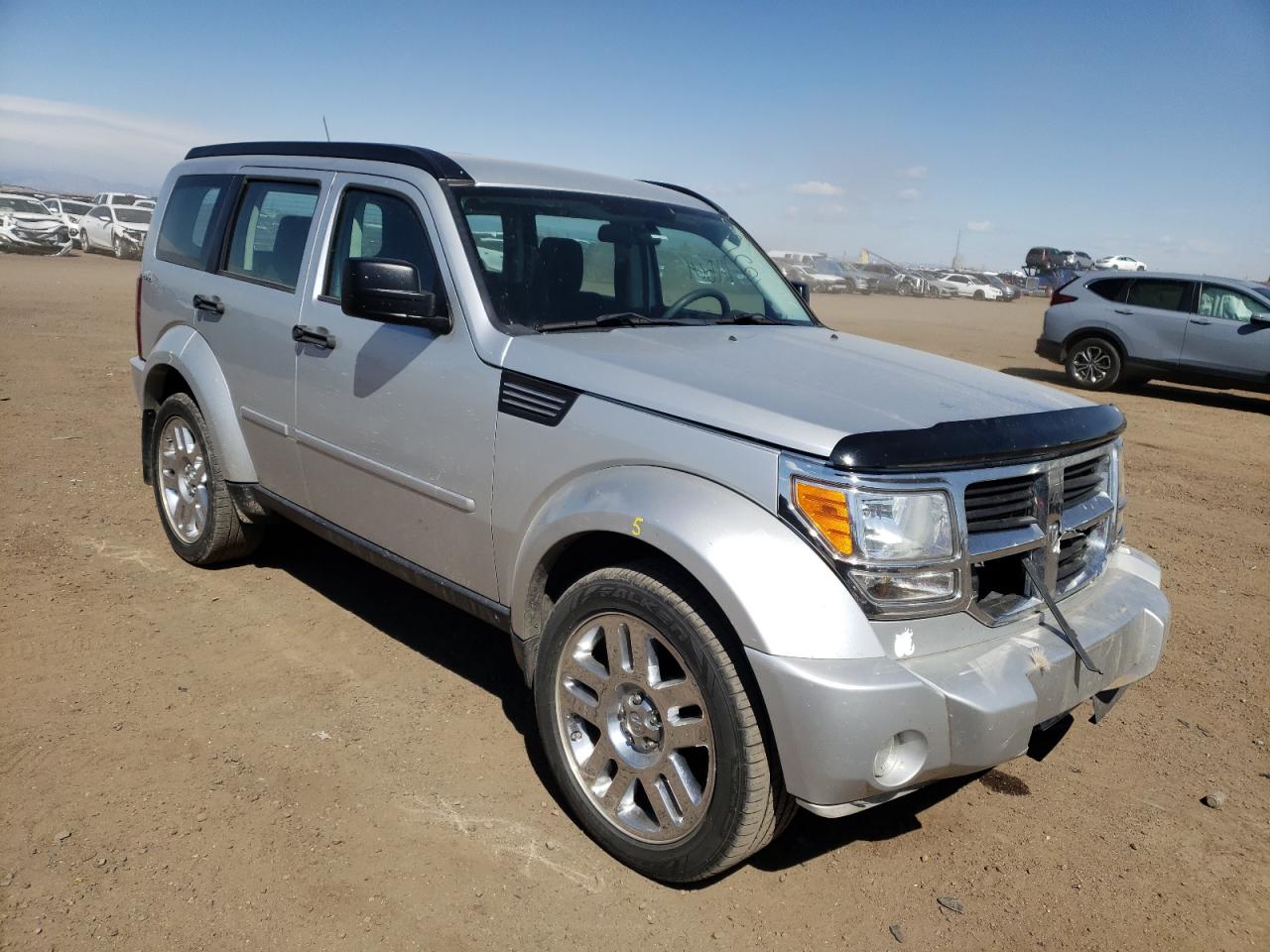 DODGE NITRO SE 2009 with VIN 1D8GU28K99W523971 - Photo from auction