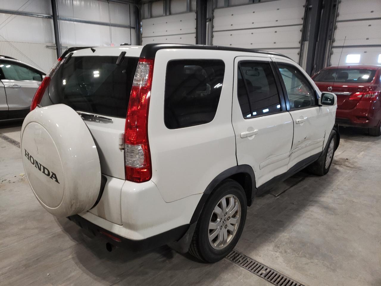 Photo 4 from auction – 2006 HONDA CR-V with VIN JHLRD789X6C059784