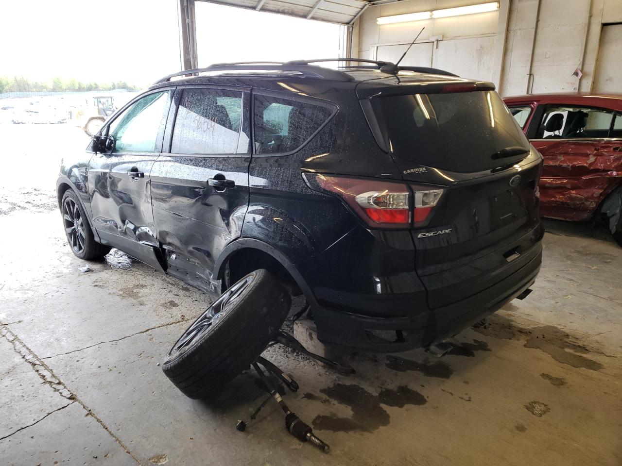 Photo 3 from auction – 2017 FORD ESCAPE TIT with VIN 1FMCU9JD2HUD03241