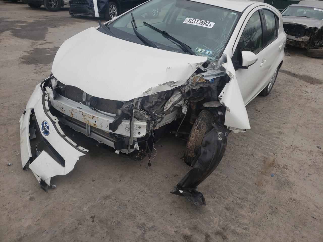Photo 9 from auction – 2014 TOYOTA PRIUS C with VIN JTDKDTB34E1566797