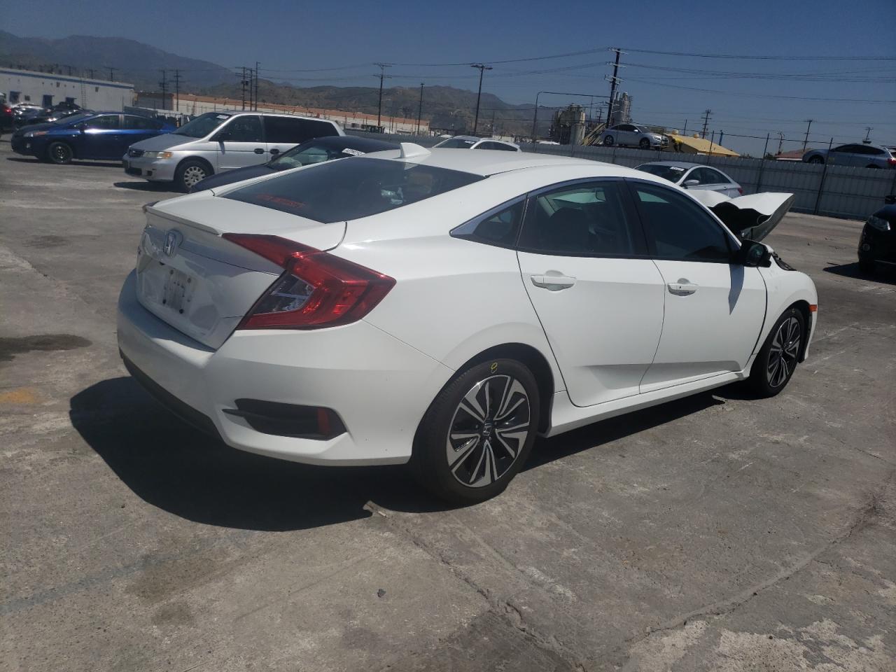 Photo 4 from auction – 2016 HONDA CIVIC EX with VIN 2HGFC1F32GH640291