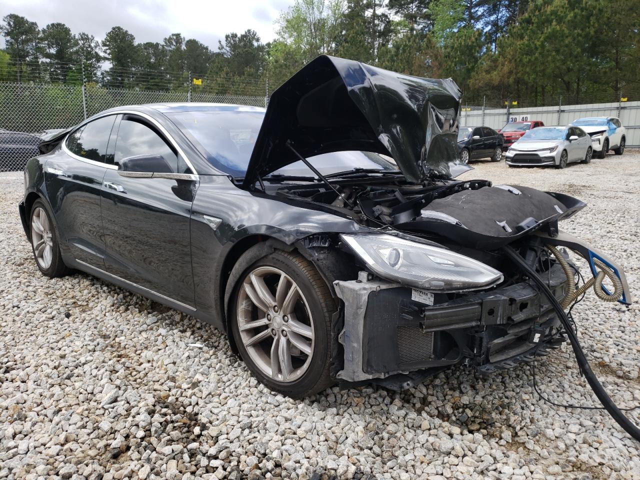 TESLA MODEL S 2015 with VIN 5YJSA1E12FF119174 - Photo from auction